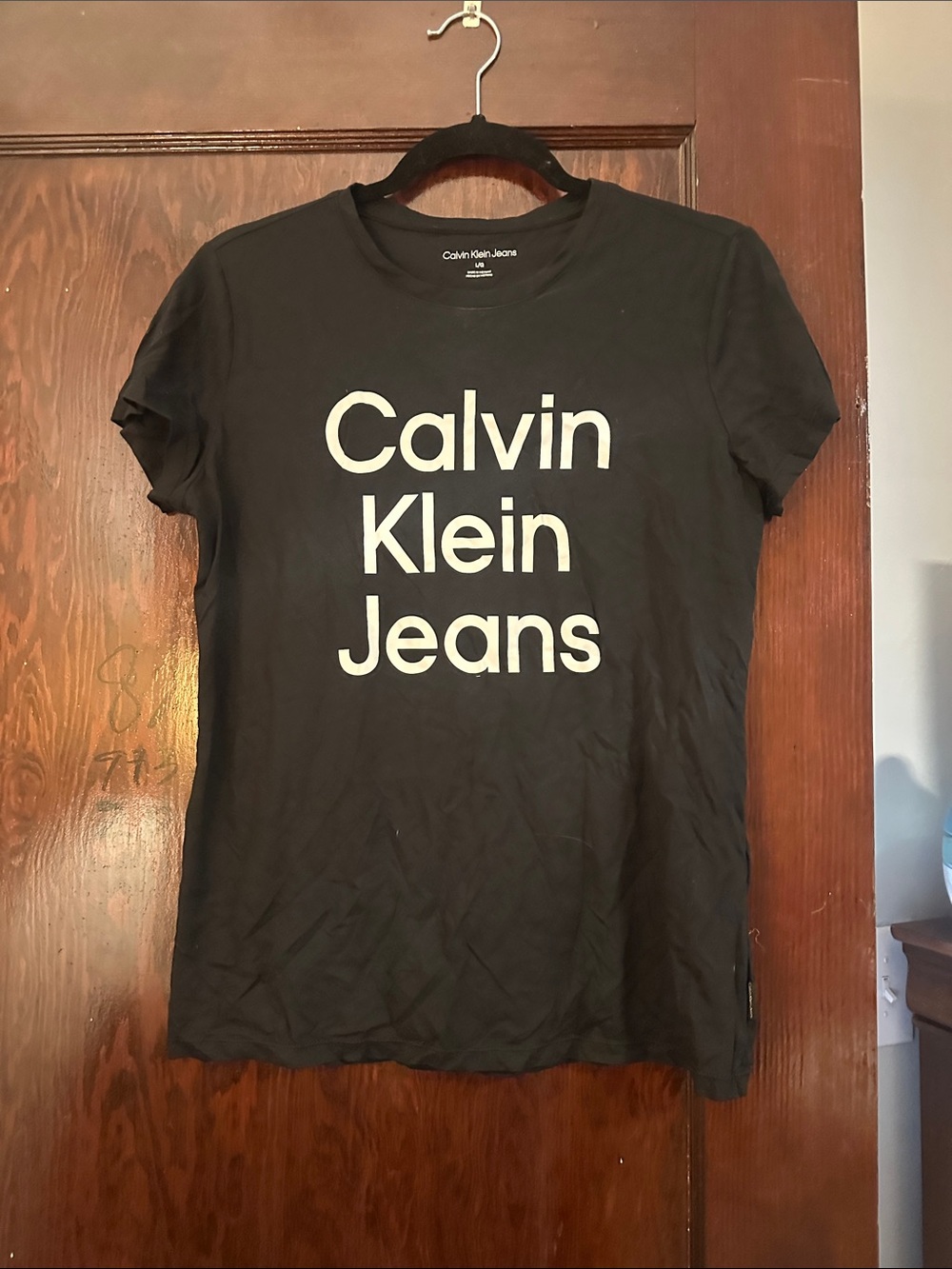 Calvin Klein Jeans Black T-shirt with White Neck Logo
